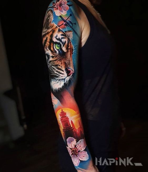 Tattoo Tygrys indyjski in animals motif and realistic style on the upper arm