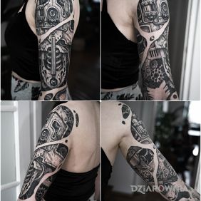 Tatuaż Steampunk na ramieniu motyw: czarno-szare styl: biomechanika