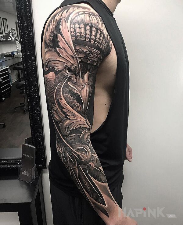 Tattoo Indiański orzeł in black and gray motif and realistic style on the upper arm