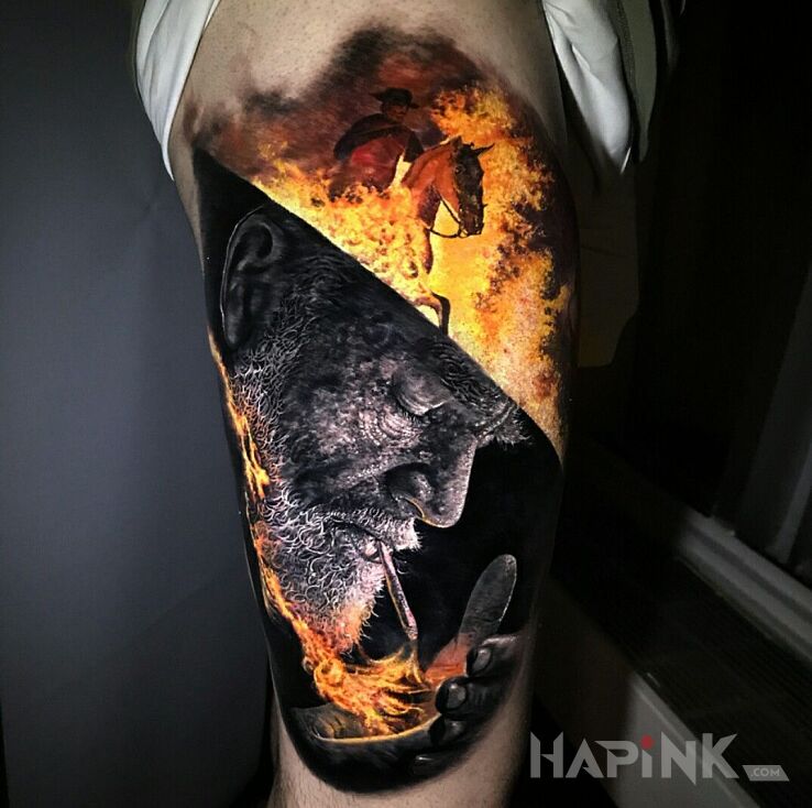 Tattoo Pożar in faces motif and realistic style on the leg