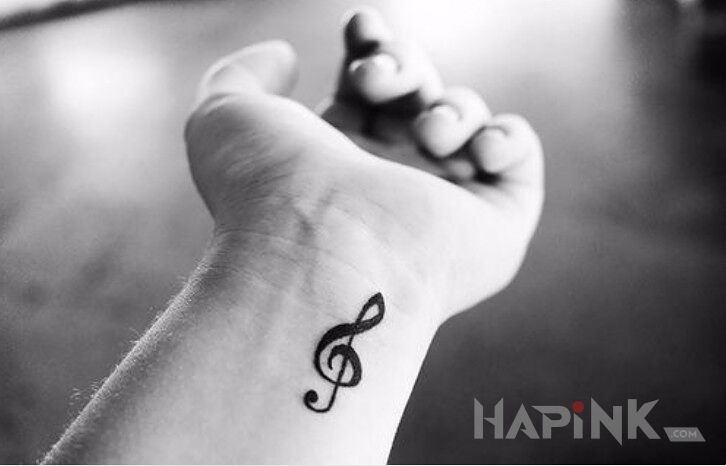 Tattoo Nutka in other motif on the wrist