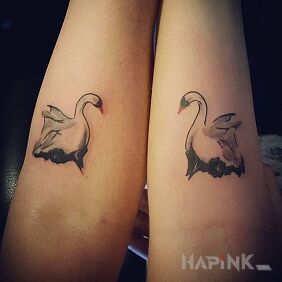 Tattoo Two swans on the forearm motif: Love