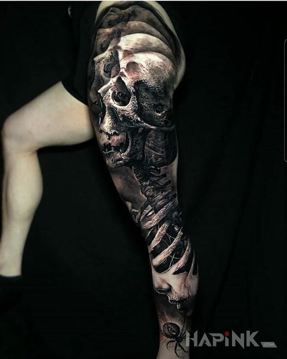 Tattoo Czaszunia in faces motif and realistic style on the calf