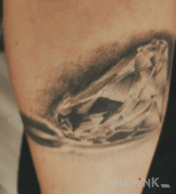 Tattoo Diament... in objects motif and graphic / illustrative style on the forearm