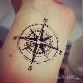 Tattoo Compass on the wrist motif: objects