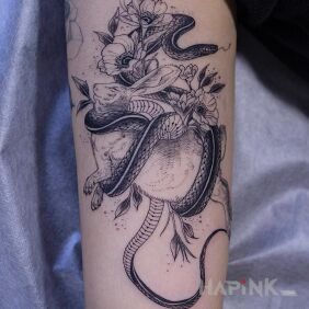 Tattoo Bunny :( on the upper arm motif: black and gray style: graphic / illustrative