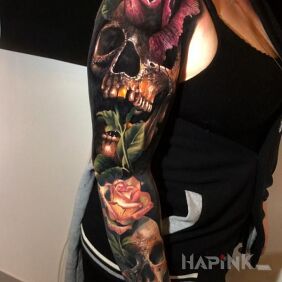 Tattoo Skulls and roses on the forearm motif: flowers style: realistic