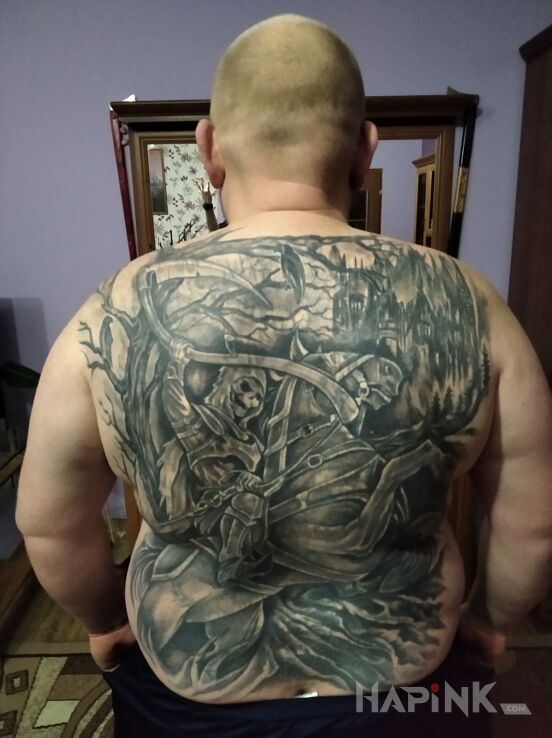 Tattoo Śmierć na koniu in black and gray motif and graphic / illustrative style on the shoulder blades
