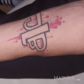Tattoo JLB on the forearm motif: lettering style: graffiti