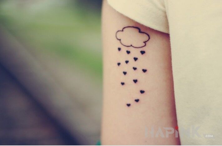 Tattoo Chmurka  in Love motif on the forearm