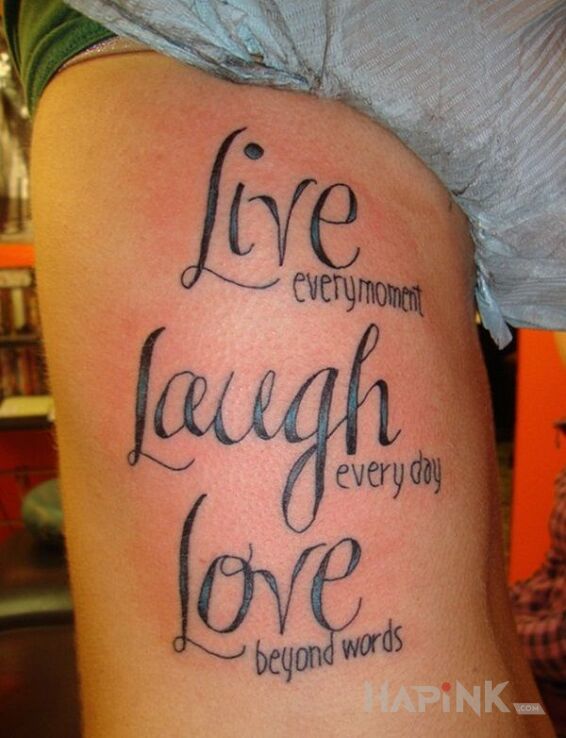 Tattoo 3 rzeczy in lettering motif and calligraphy style on the ribs