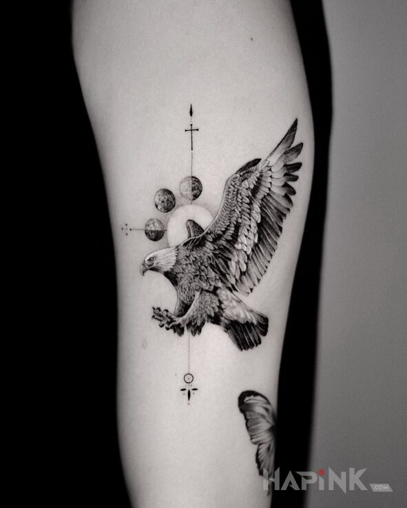Tattoo Orzeł in black and gray motif and realistic style on the upper arm