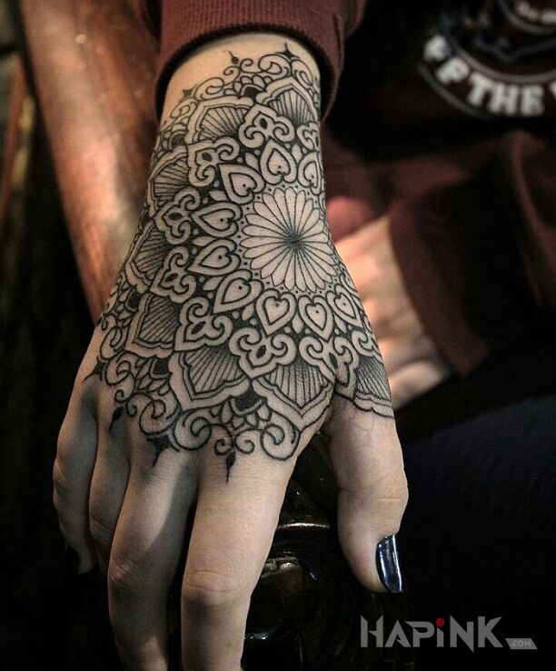 Tattoo Mandala in mandalas motif on the hand