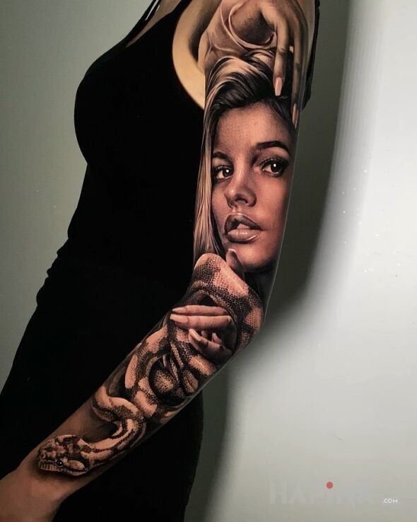 Tattoo Dziewczyna z wężem in sleeves motif and realistic style on the upper arm