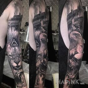 Tattoo The lion together with the eagle on the upper arm motif: animals style: realistic