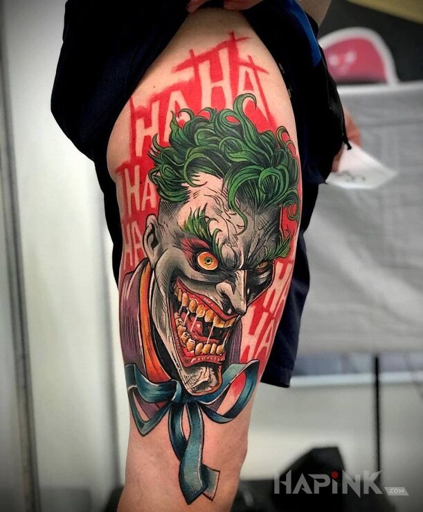 Tattoo Haha joker in colorful motif and cartoon / comic book style on the leg