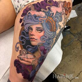 Tattoo Fabulous design on the leg motif: faces style: neo-traditional