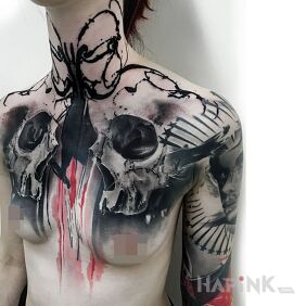 Tattoo Trashpolka skulls on the upper arm motif: dark style: trash polka