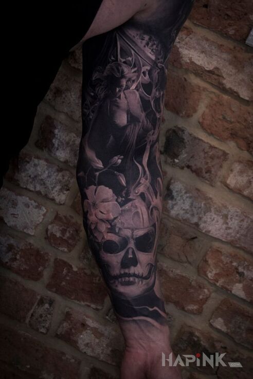 Tattoo Naga dziewczyna in sleeves motif and realistic style on the forearm