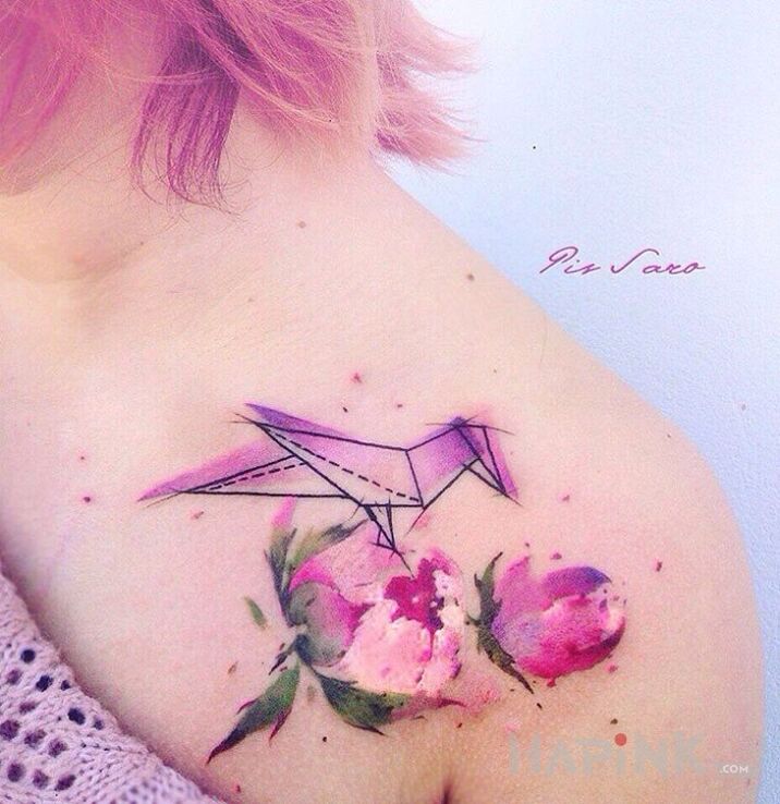 Tattoo Kwiatek in flowers motif on the chest