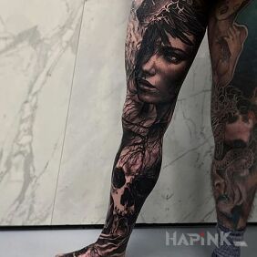 Tattoo The feminine face on the calf motif: 3D style: realistic