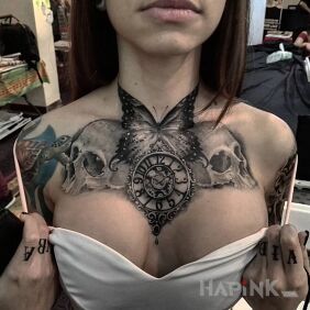Tattoo Spicy and beautiful on the chest motif: butterflies style: realistic