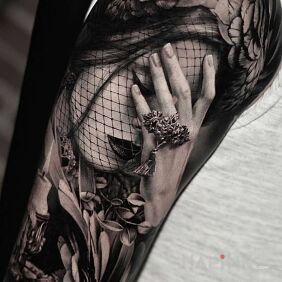 Tattoo Facepalm on the upper arm motif: faces style: realistic