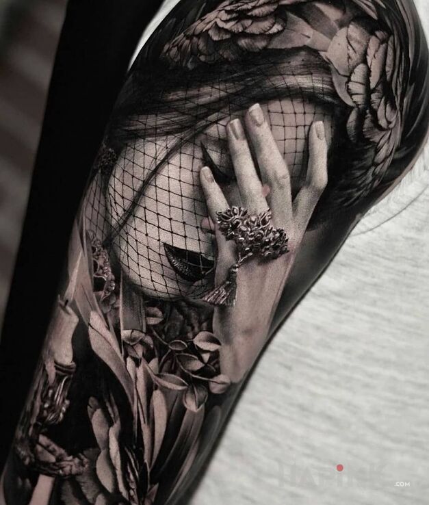 Tattoo Facepalm in 3D motif and realistic style on the upper arm