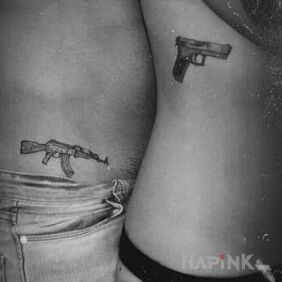 Tattoo He a rifle she a gun on the ribs motif: Love style: graphic / illustrative