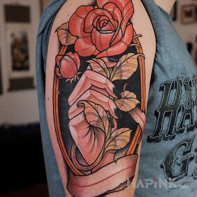 Tattoo Rose / Flower / Hand / Ribbon / Sash on the upper arm motif: colorful style: neo-traditional
