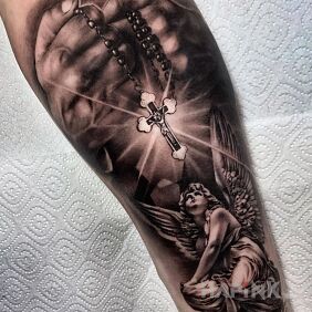 Tattoo Rosary and angel on the forearm motif: 3D style: realistic