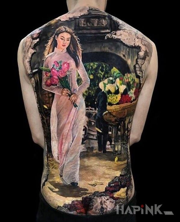 Tattoo Dziewczyna z kwiatami in 3D motif and realistic style on the shoulder blades