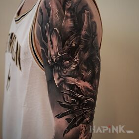 Tattoo Ent on the upper arm motif: characters style: realistic