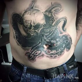 Tattoo Craken on the stomach motif: black and gray style: graphic / illustrative