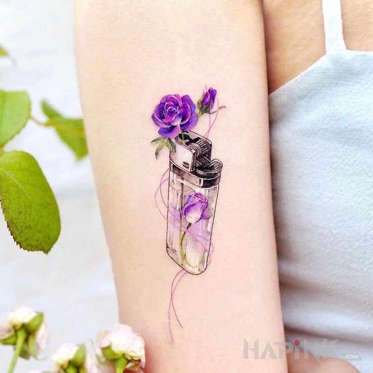 Tattoo Zapalniczka in 3D motif and realistic style on the upper arm