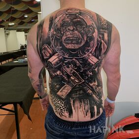 Tattoo Tattoo expo Rome 2020 on the back motif: black and gray style: realistic