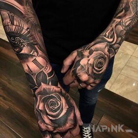 Tattoo Rose hands on the hand motif: flowers style: realistic