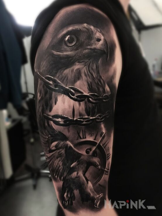 Tattoo Orzeł in black and gray motif and realistic style on the upper arm