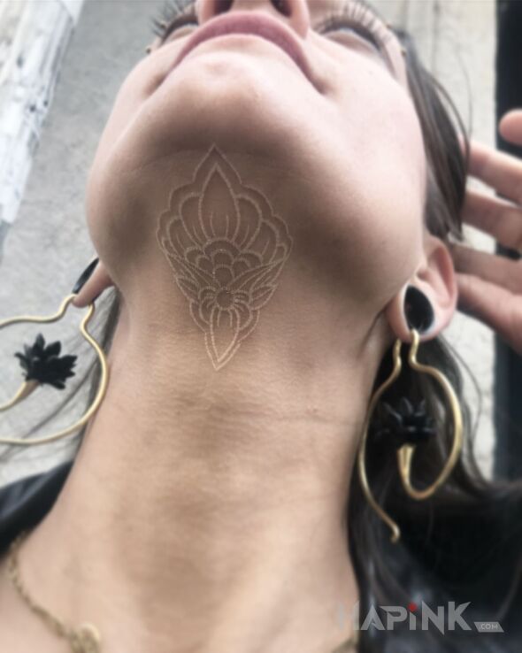 Tattoo Wzorek pod szczęką in other motif and white ink style on the throat