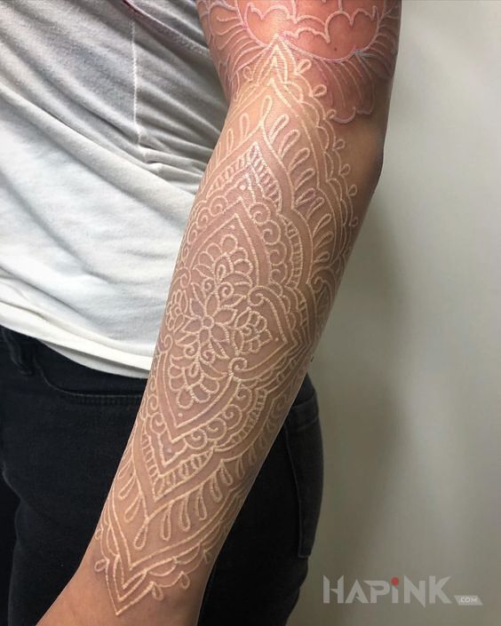 Tattoo Mandala numer 2 in mandalas motif and white ink style on the forearm