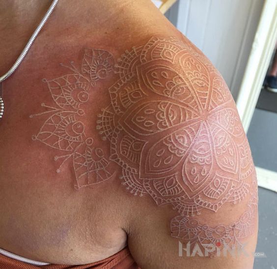 Tattoo Mandala numer 3 in mandalas motif and white ink style on the upper arm
