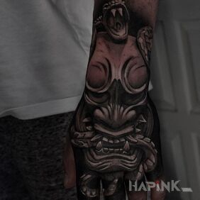 Tattoo Snake on the hand on the hand motif: dark style: realistic