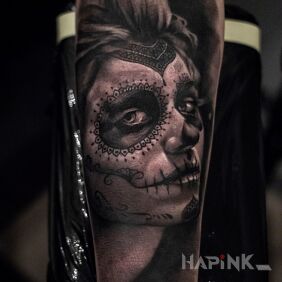 Tattoo Muerte on the forearm motif: black and gray style: realistic