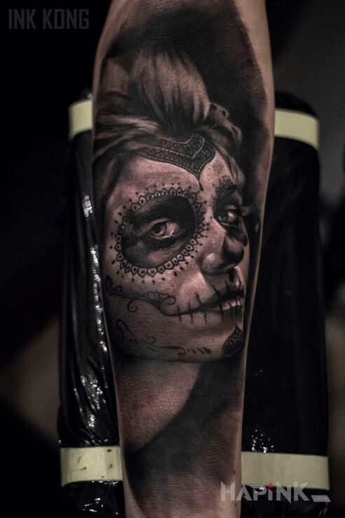 Tattoo Muerte in black and gray motif and realistic style on the forearm