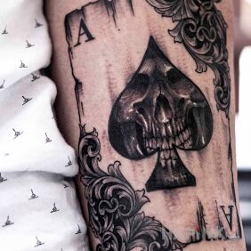 Tattoo Dark Ace on the forearm motif: skulls style: graphic / illustrative