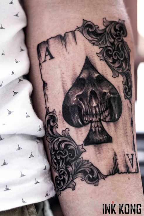 Tattoo Mroczny As in black and gray motif and graphic / illustrative style on the forearm