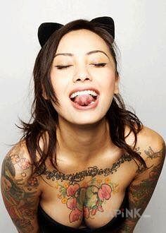 Tattoo Catwoman in sexy motif on the upper arm