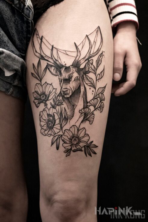 Tattoo Jeleń in black and gray motif and graphic / illustrative style on the leg