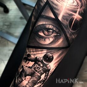 Tattoo Eye in space on the forearm motif: cosmos style: realistic