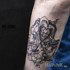 Tattoo Joker on the forearm motif: objects style: graphic / illustrative